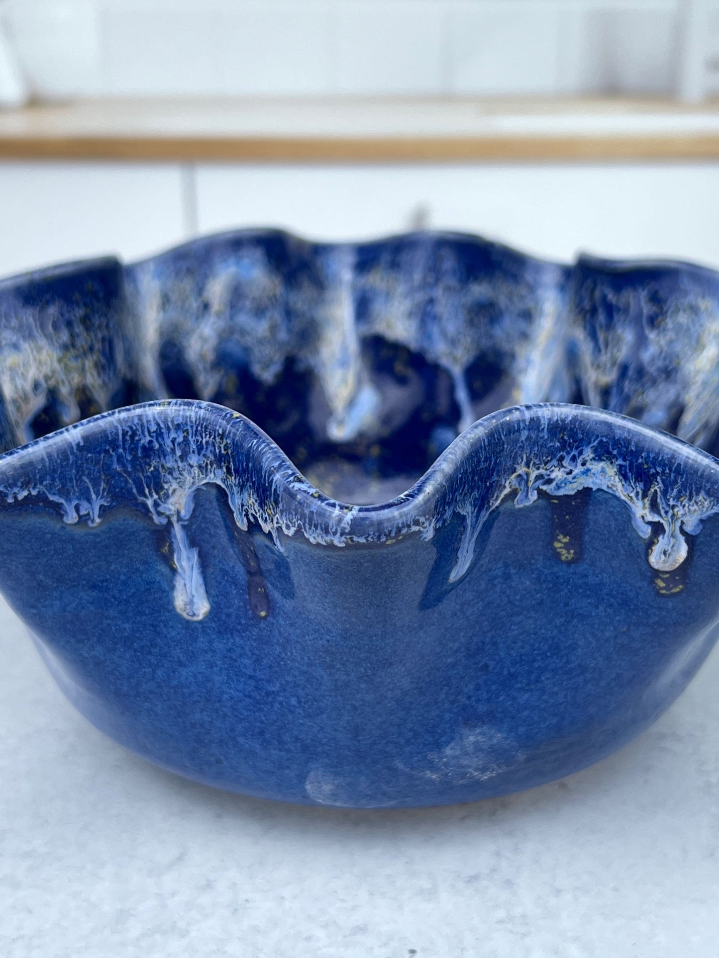 Wheel Thrown Drooped Porcelain Bowl with a Blue and White Blended Glaze