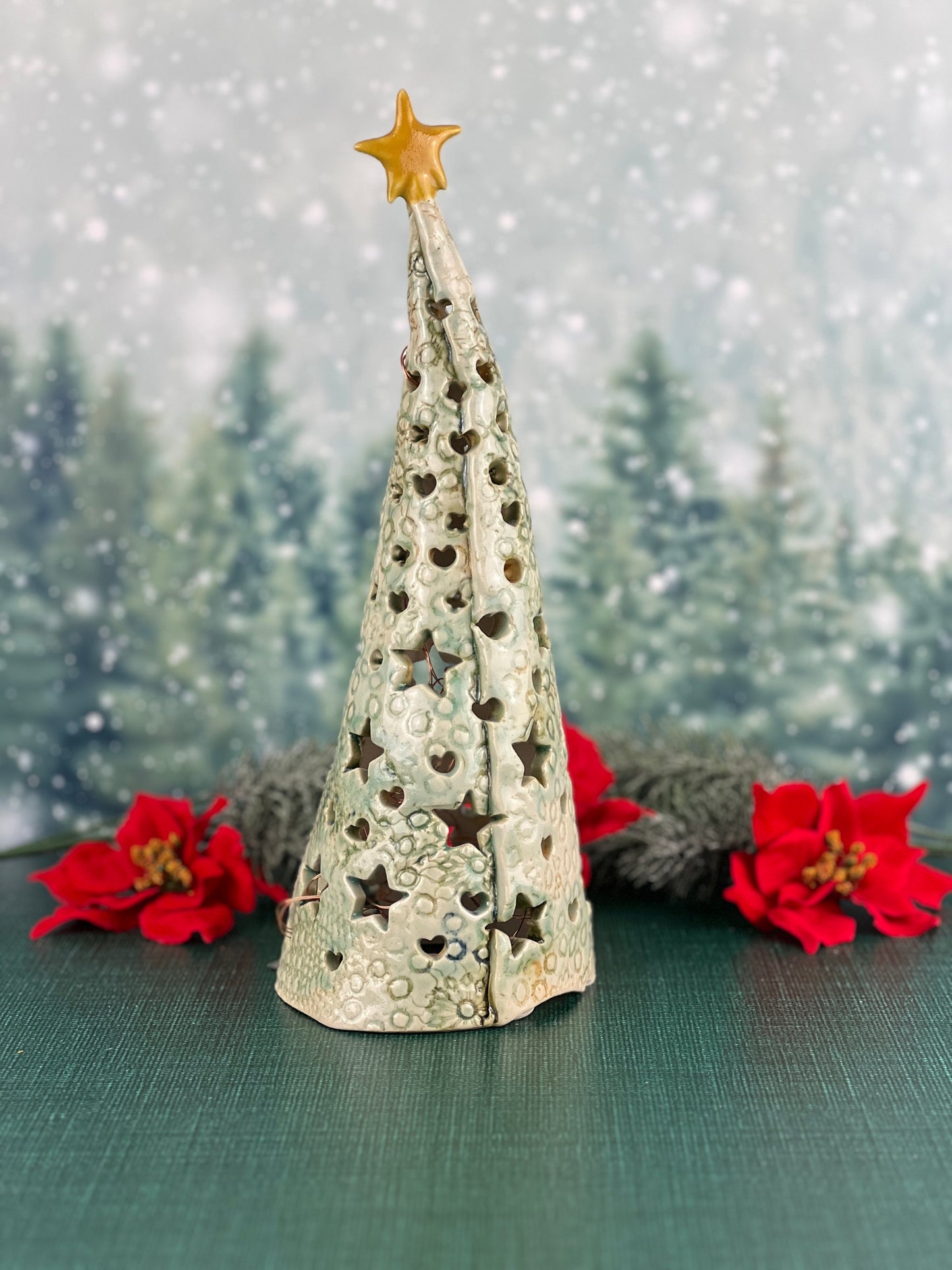 Christmas tree with star and heart holes