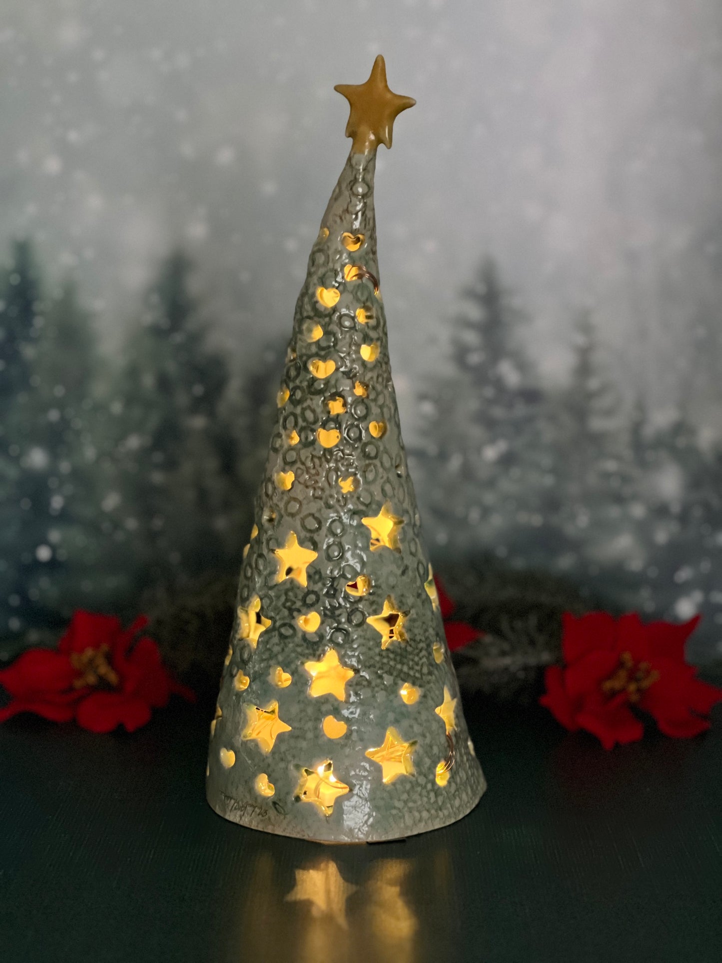 Christmas tree with star and heart holes