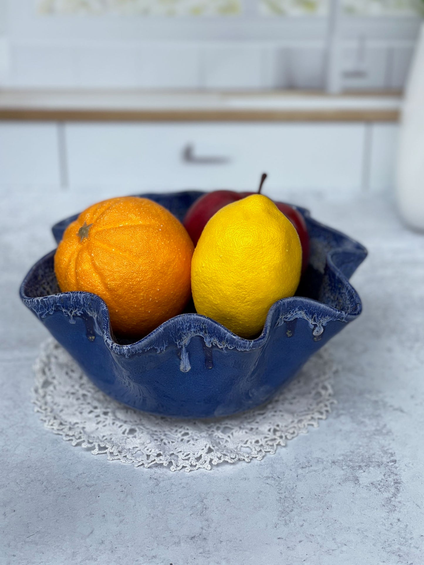 Wheel Thrown Drooped Porcelain Bowl with a Blue and White Blended Glaze