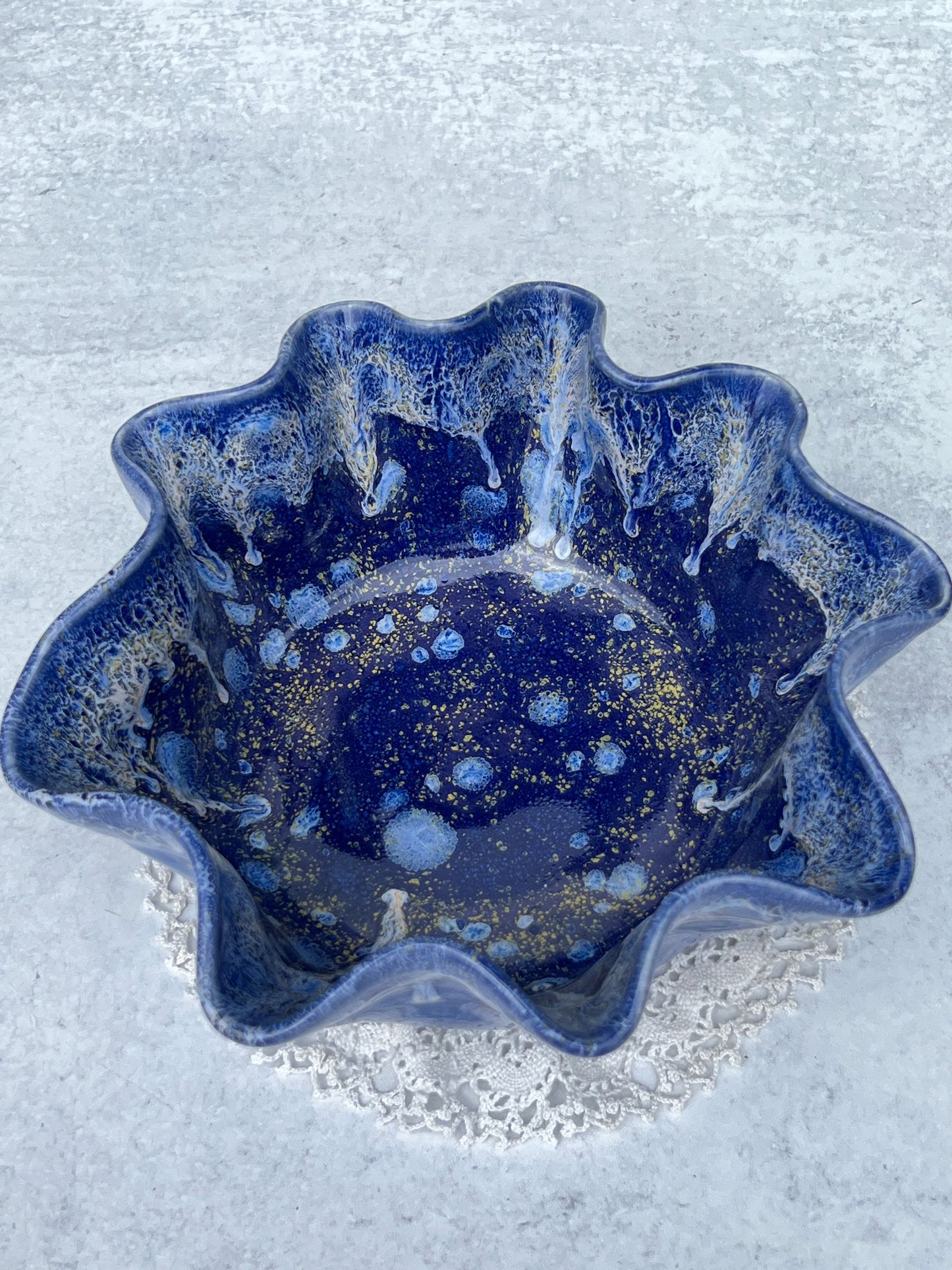 Wheel Thrown Drooped Porcelain Bowl with a Blue and White Blended Glaze