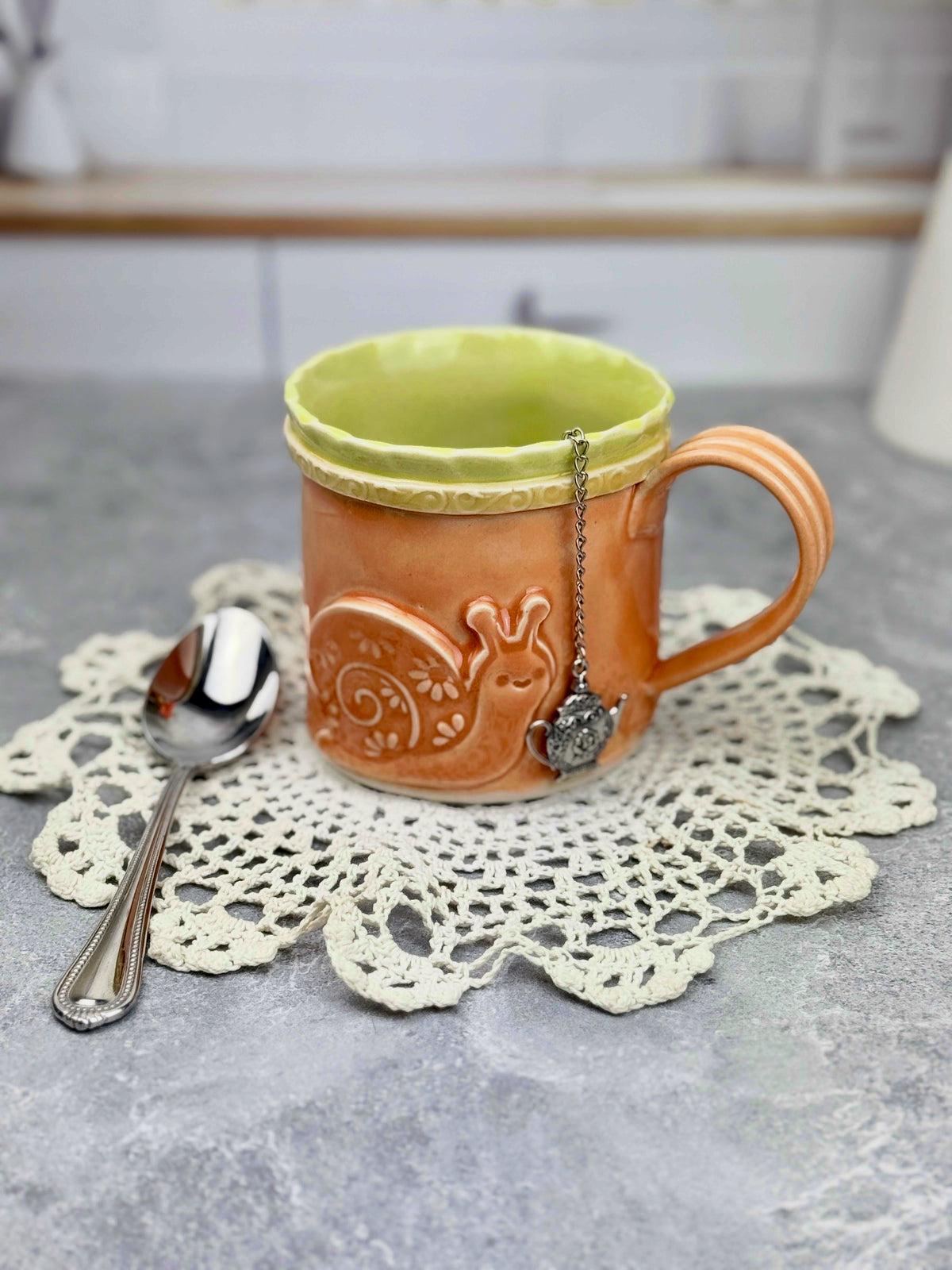 Brightly Glazed Orange Green and Yellow Mugs with various animal designs