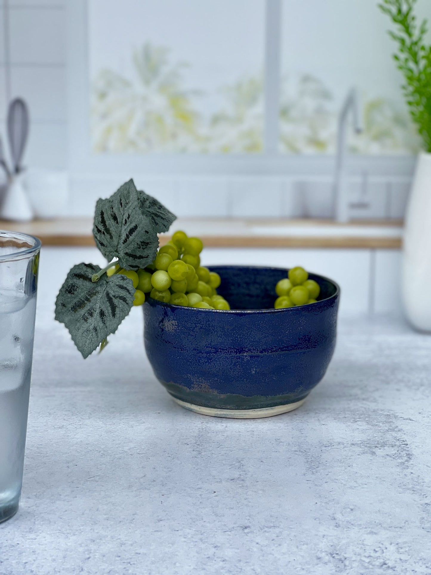 Small Wheel Thrown Porcelain Bowl with a Blue Spark Glaze