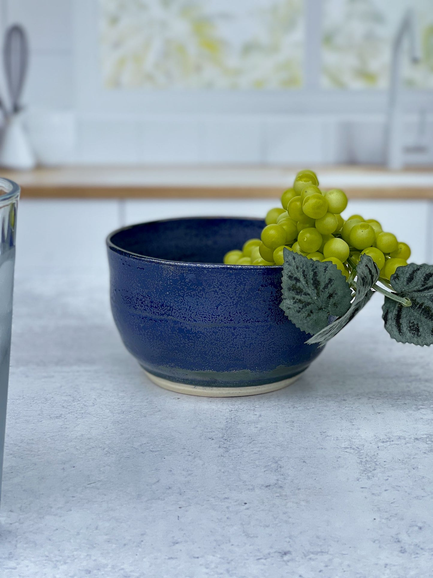 Small Wheel Thrown Porcelain Bowl with a Blue Spark Glaze